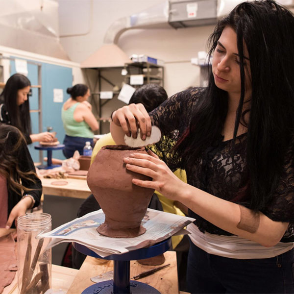 Student crafting ceramics
