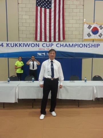 male standing at the 2014 Kukkiwon Cup Championship