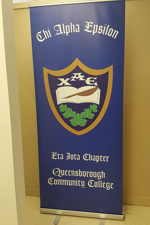 Chi Alpha Epsilon Eta Iota Chapter banner.
