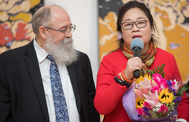 Faustino Quintanilla, Executive Director, QCC Art Gallery with artist Wenzhi Zhang