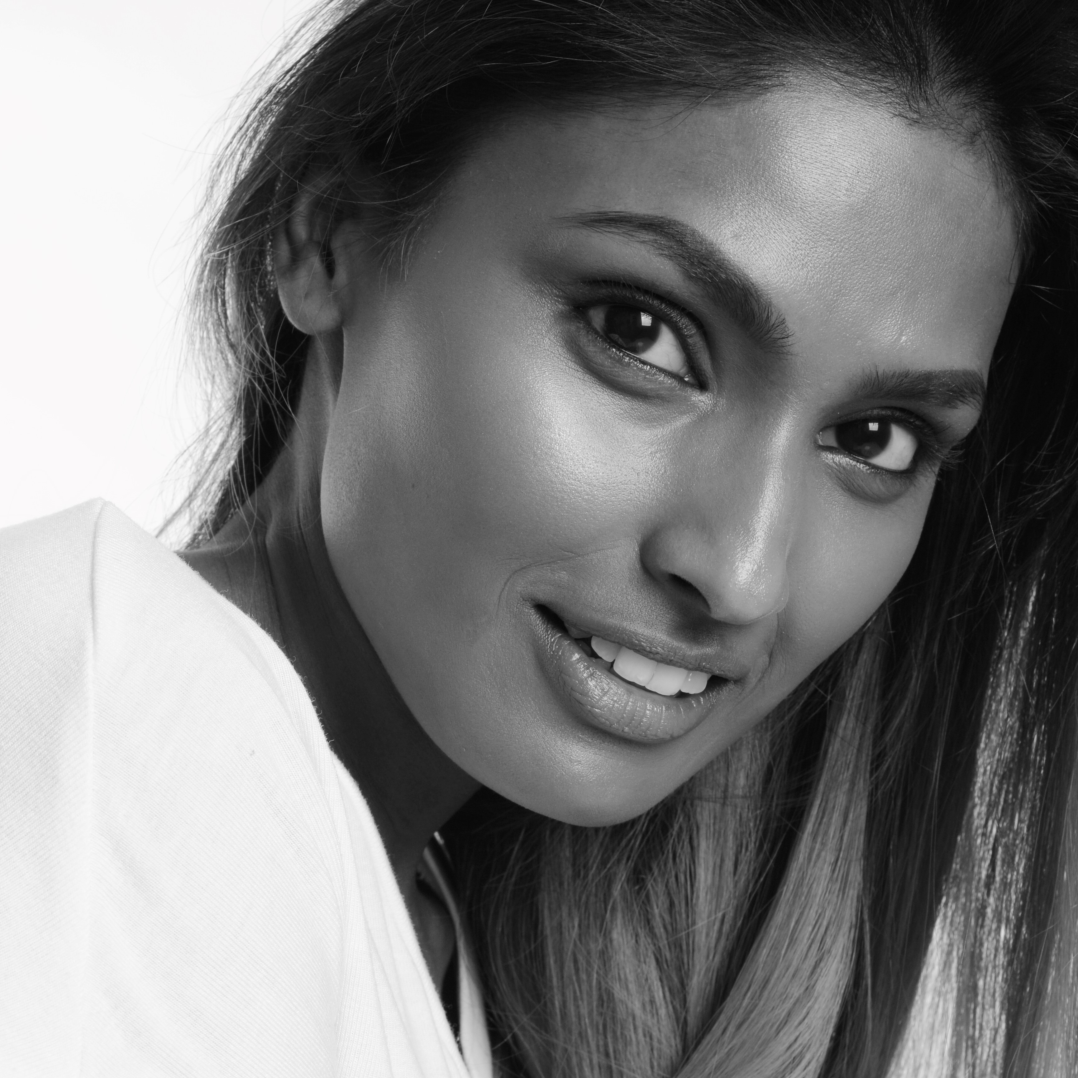 black and white headshot of Anika Meem