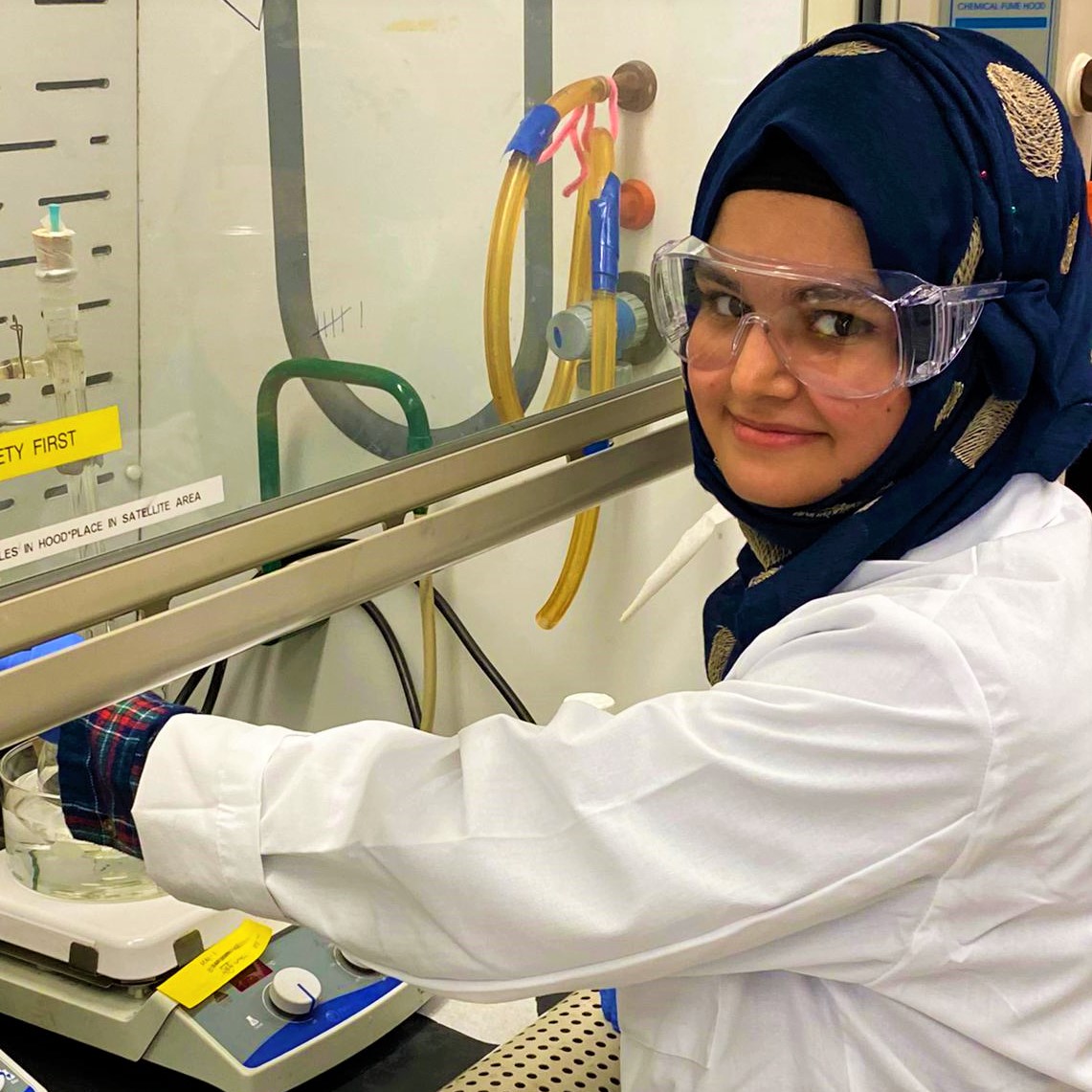 Mehreen Mughal in the lab, wearing goggles