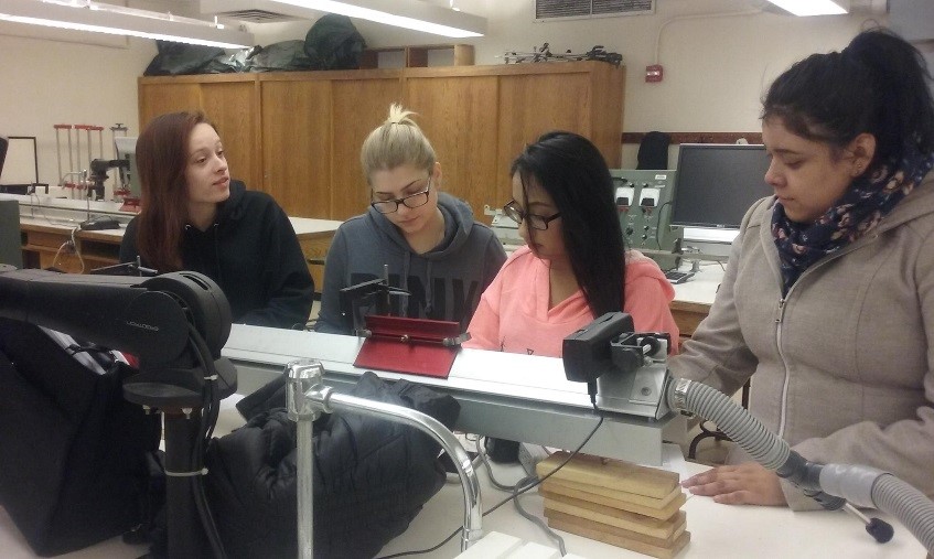 QCC Students engaged in conducting research in the lab